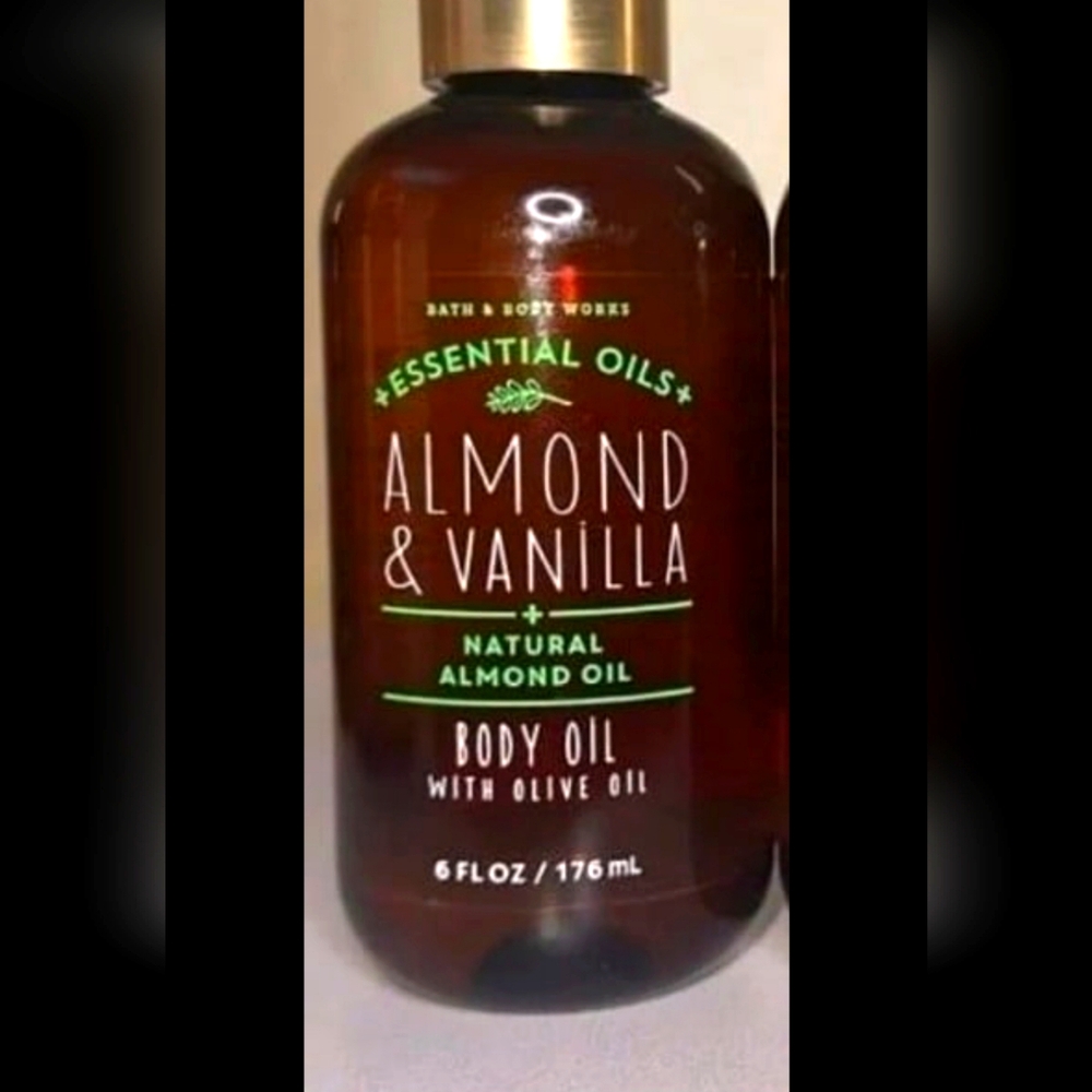 New bath and body works essential body oil. 6oz Discontinued Almond & Vanilla.